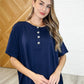 In the Rotation Exposed Seam Tee in Navy